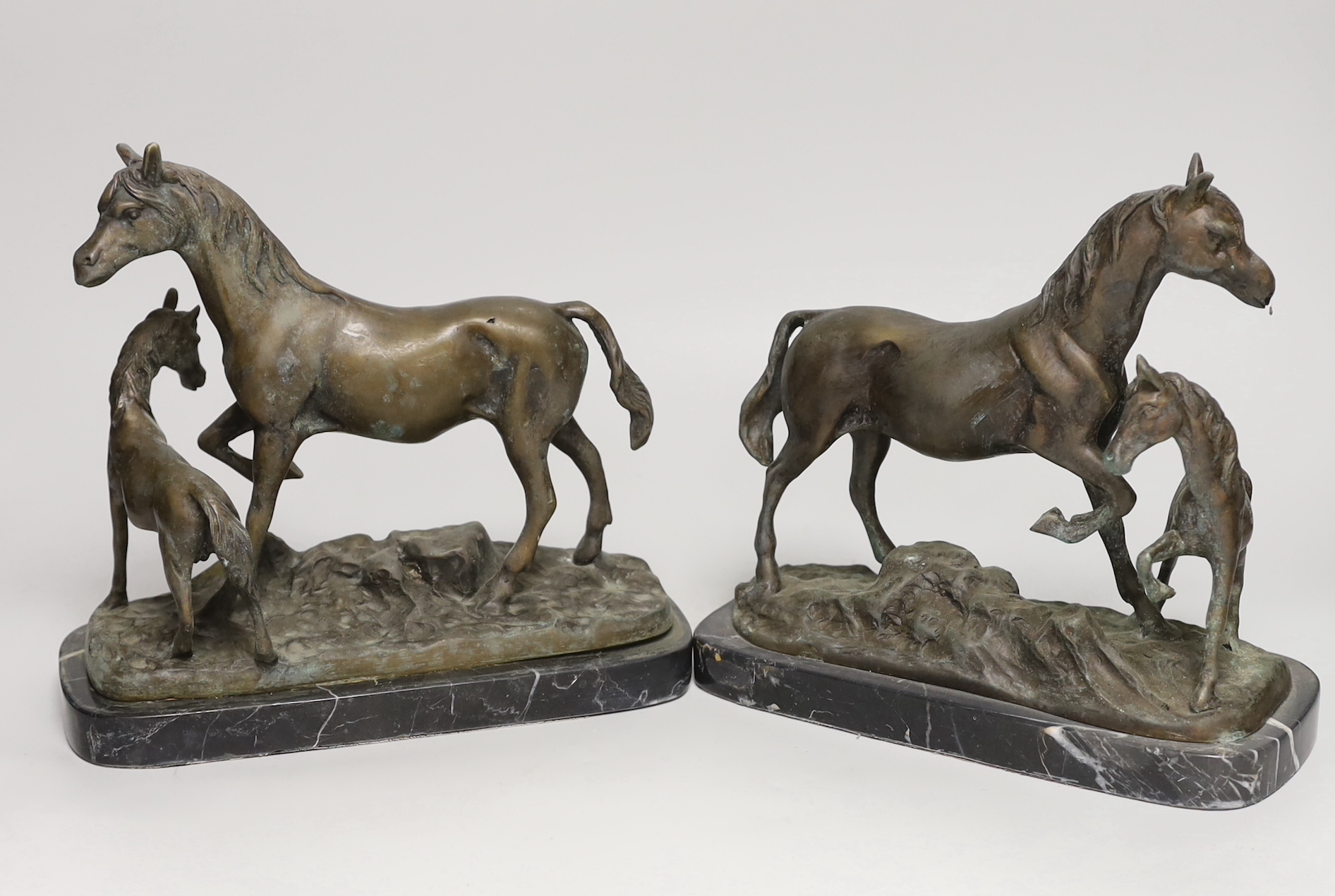 A pair of bronze horse and foals, raised on marble bases, each 22cm high